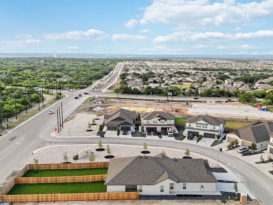 The community from above — streets, lots and perimeter fencing.
