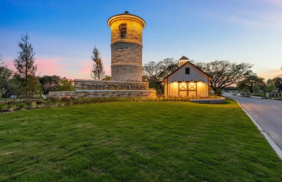 The Corley Farms entry monument at dusk.