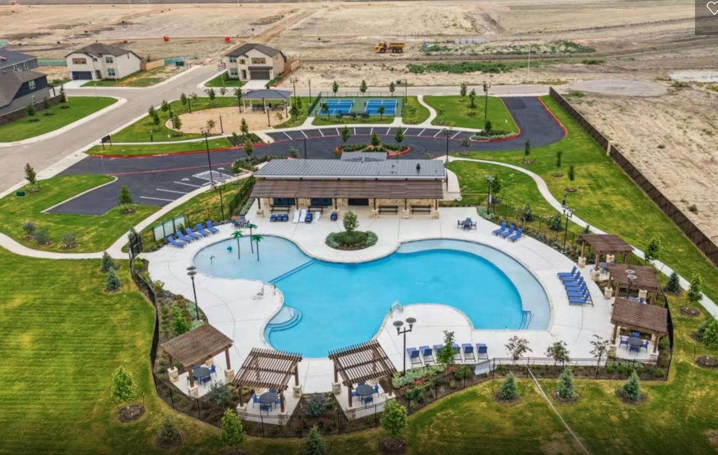 The amenity center and pool from above.