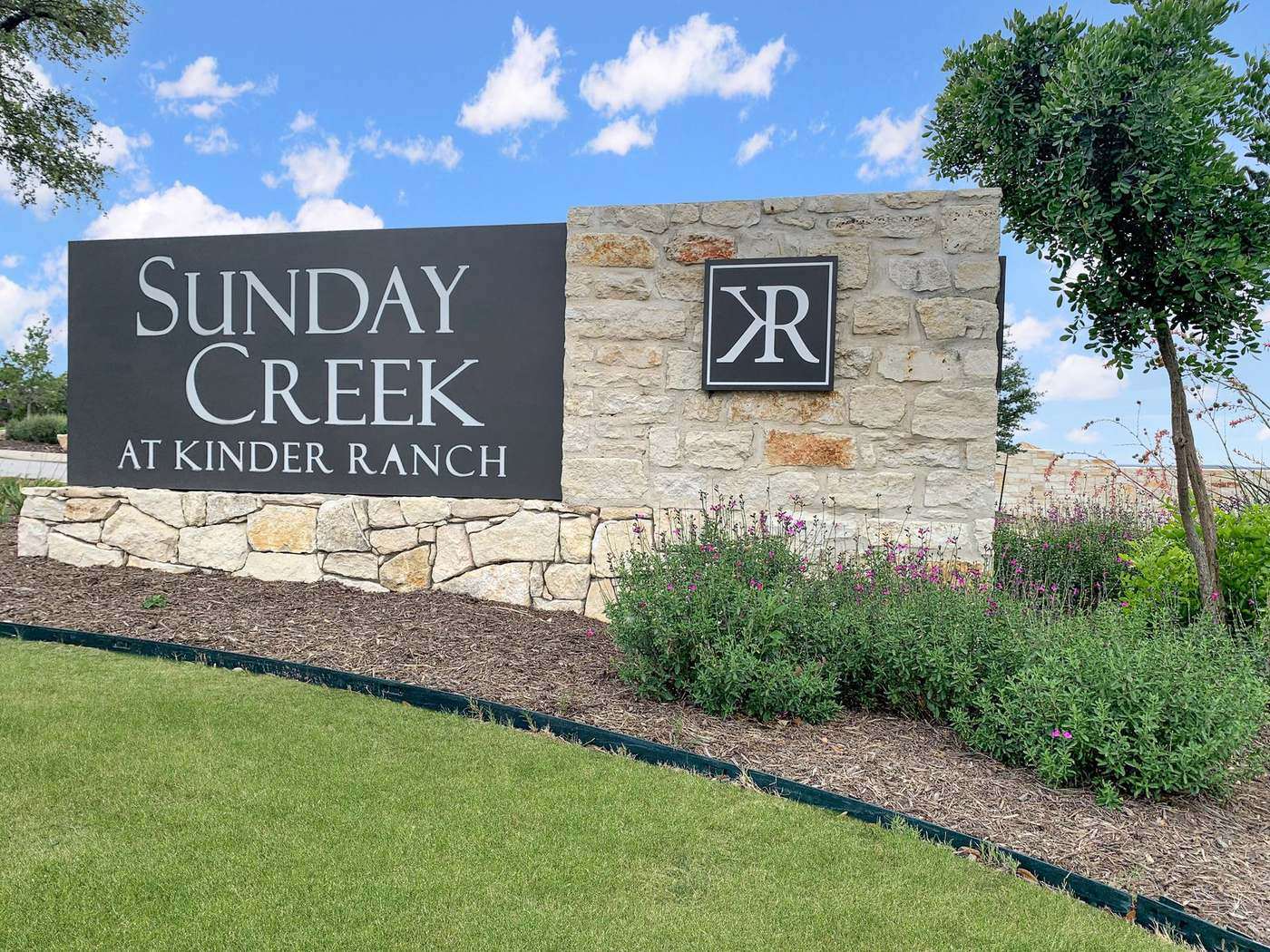The Sunday Creek at Kinder Ranch entry monument.